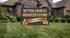 A yard sign with the text &