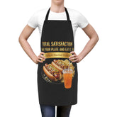 Person wearing a black apron with a hot dog and drink graphic and text.